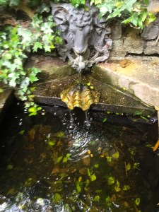 and a baroque grotto with a water feature