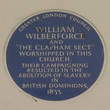 The blue plaque on the church, commemorating the 'Clapham Sect'.