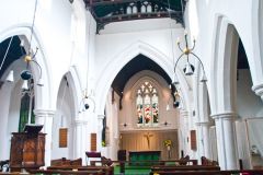 The interior of St Bene't's church.