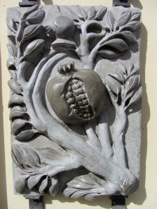 Carved pomegranate in Granada.