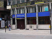 The London Stone, still in its niche on Cannon Street, though the surroundings have changed a bit since Ailwyn's day.