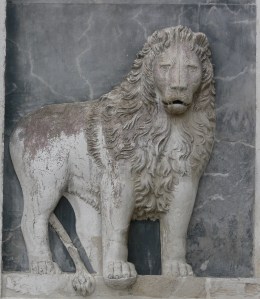 One of the many lions on the front of the Scuola Grande di San Marco.