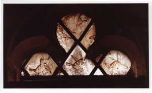 The central diamond shows a bird with an arrow in its chest.