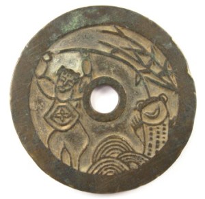 Liu Hai is also depicted as a young boy, as in this Chinese good-luck token.