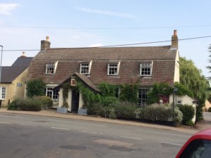 The Willow Tree pub in Bourn, opposite the road up to the Hall, the church and the former vicarage.
