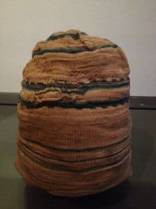 Orange and blue stripes – though some of the colours may have altered after their time in the earth.