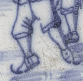 Delftware tile with a skating scene