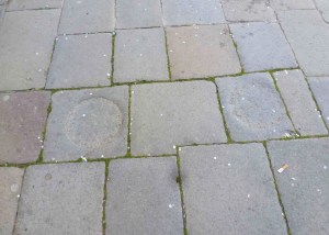 The indentations where the mortars stood. The cigarette butts are modern.