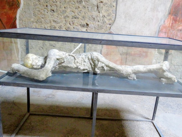 One of the famous plaster casts of a body found at Pompeii.