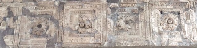 Section of a vaulted ceiling at Herculaneum, the many-petalled flowers in square frames resembling those of the portico of the Fitzwilliam Museum, Cambridge (below). 